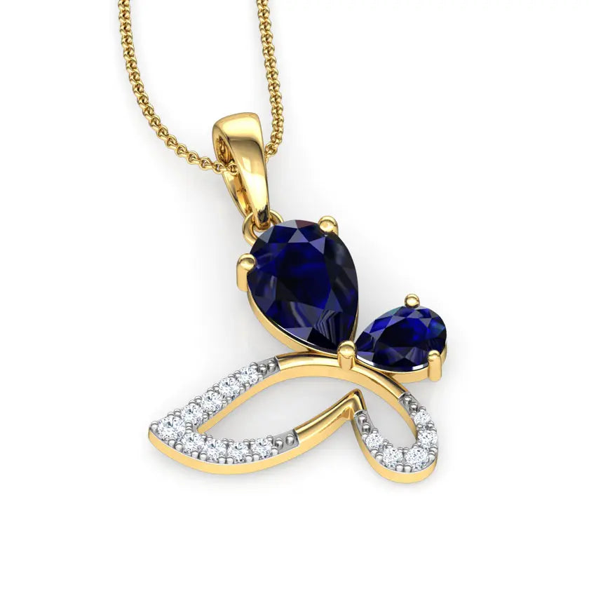 Gold pendant with blue gemstones and diamond accents on a white background