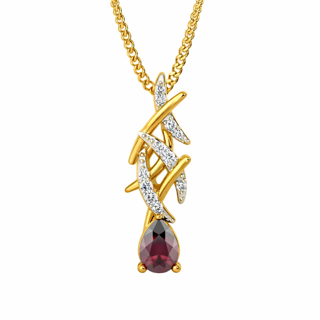 Gold and silver necklace with a red gemstone pendant on a white background
