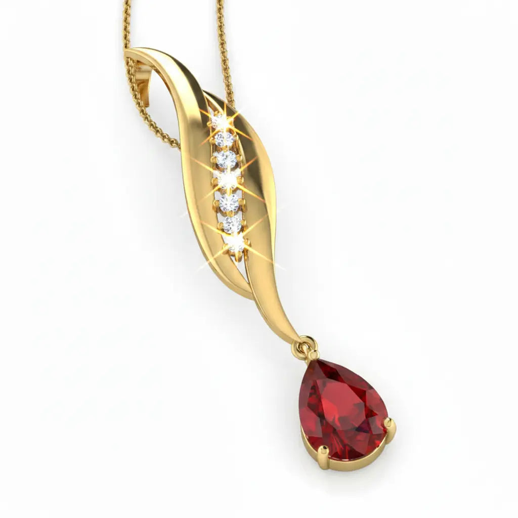 Gold pendant with a red gemstone on a white background