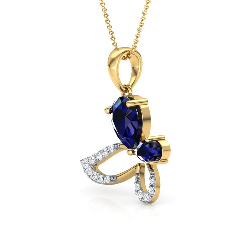 Gold pendant with blue gemstone and diamond accents on a white background