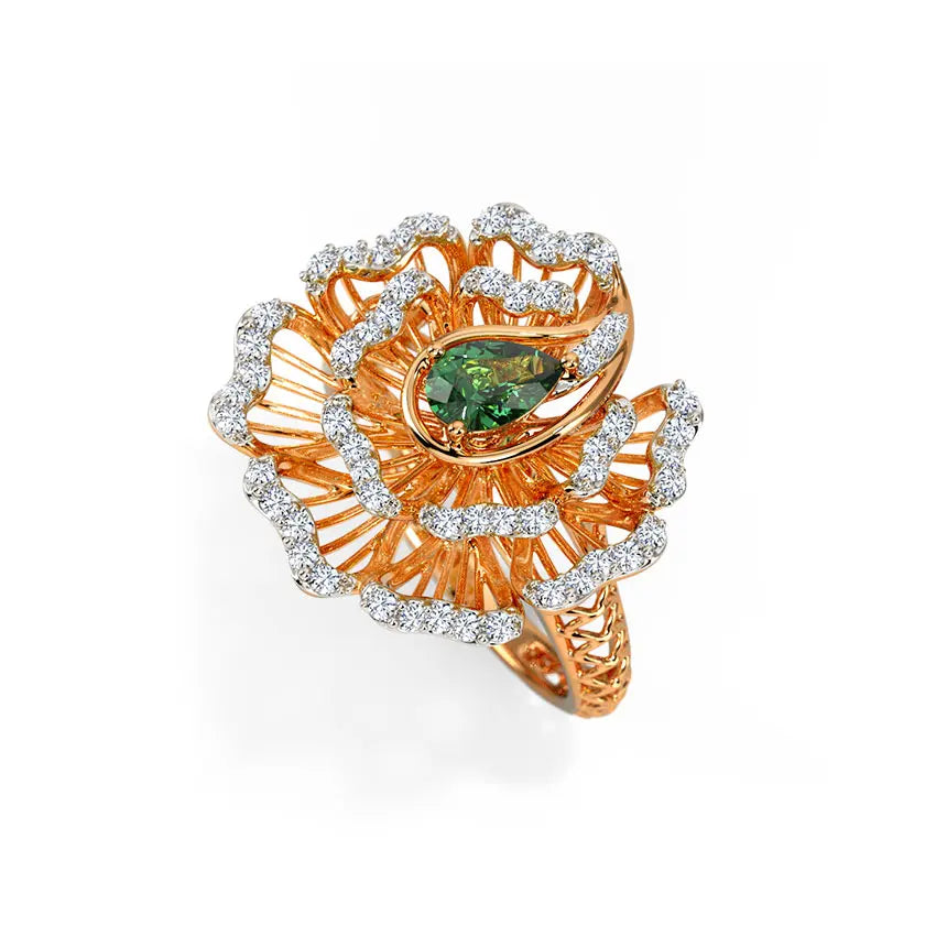 Gold ring with green gemstone and diamond accents on a white background