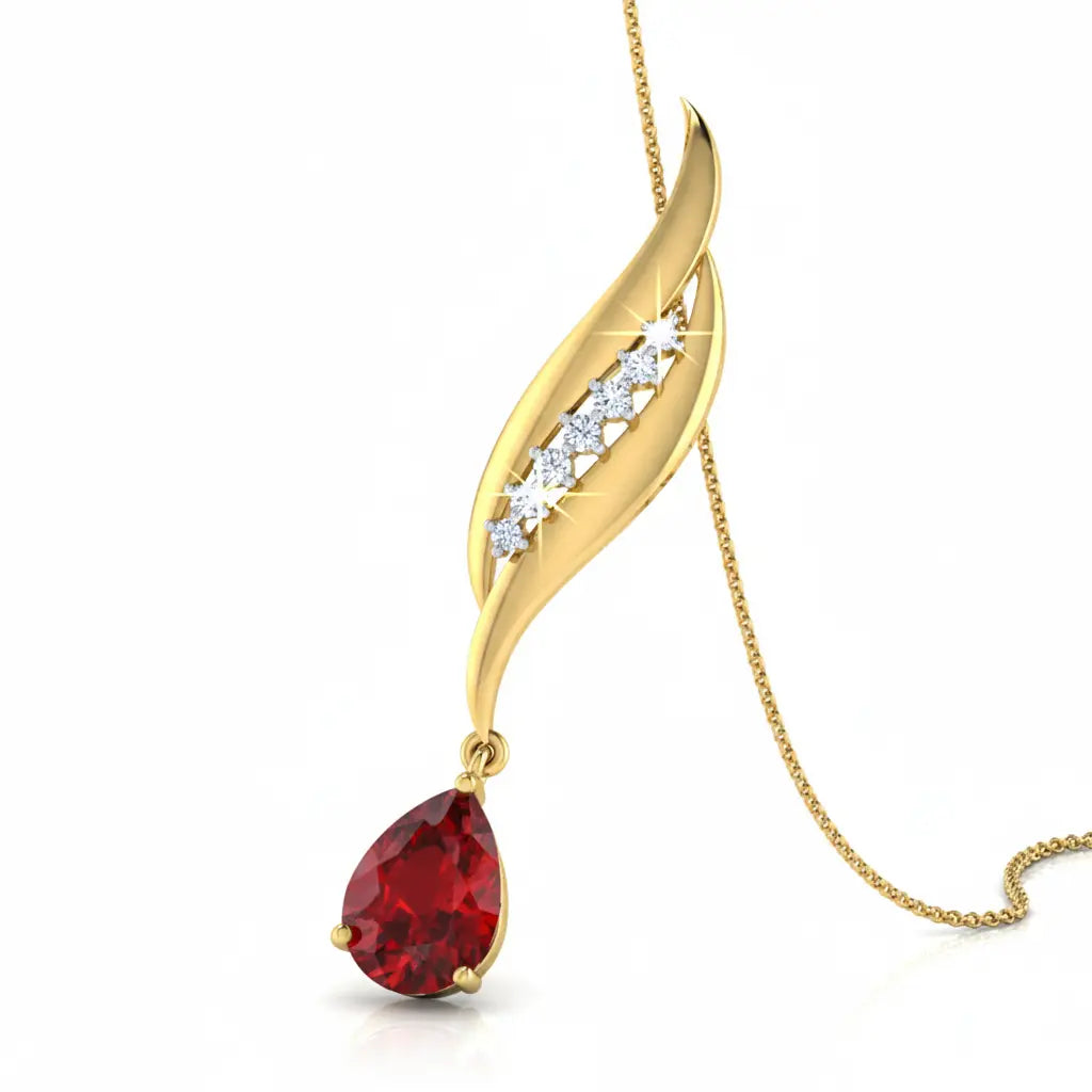 Gold pendant with red gemstone and diamond accents on a white background