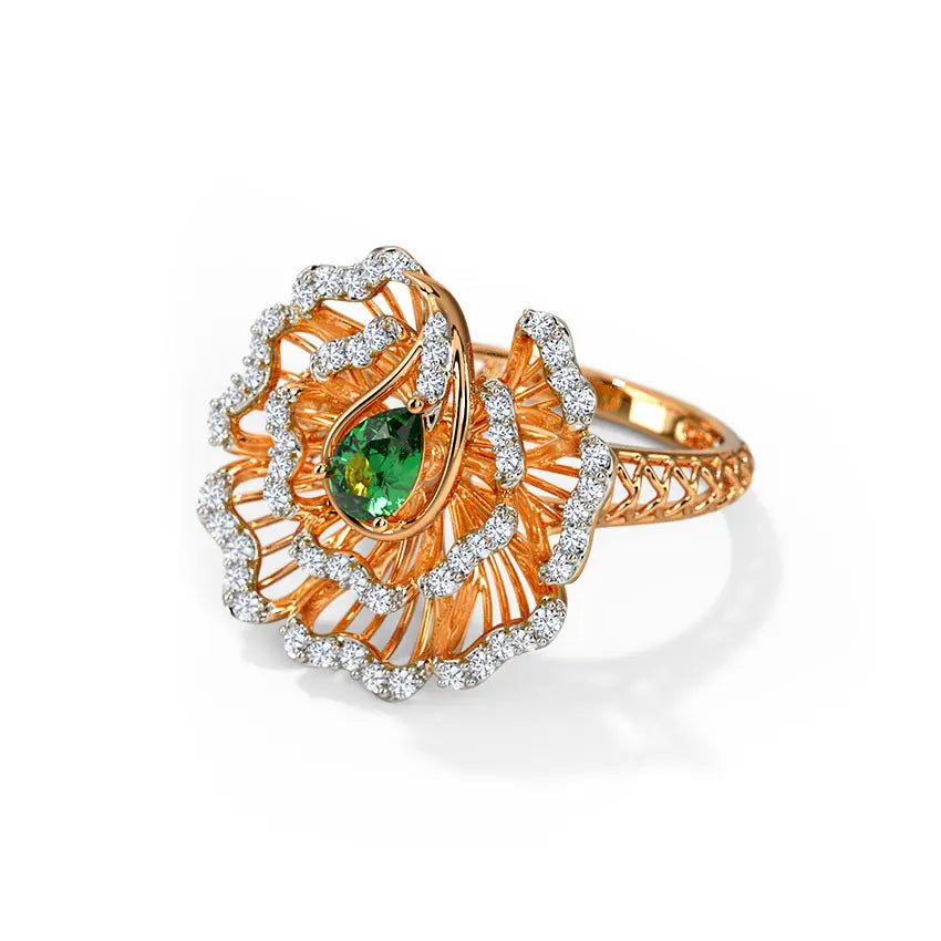 Gold ring with green gemstone and diamond accents on a white background