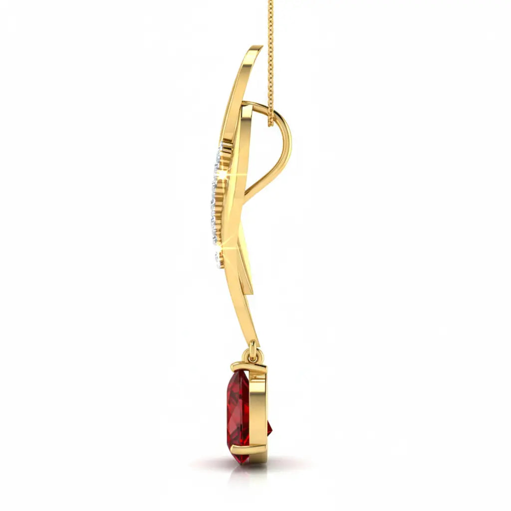Gold pendant with a red gemstone on a white background
