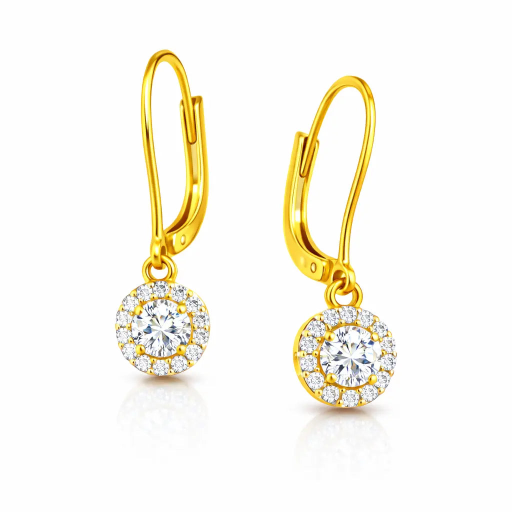 Gold earrings with clear gemstones on a white background