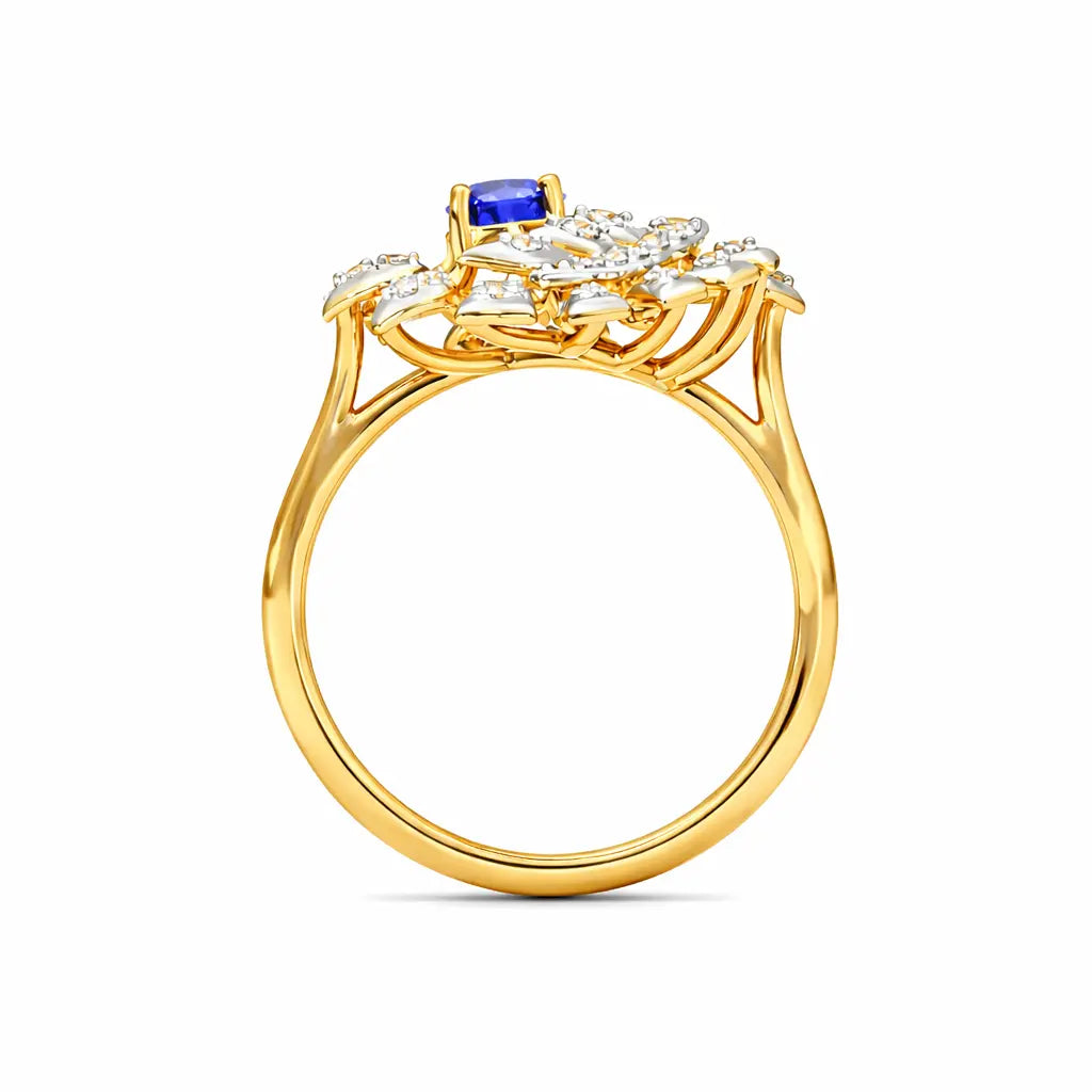 Gold ring with a blue gemstone and diamond accents on a white background