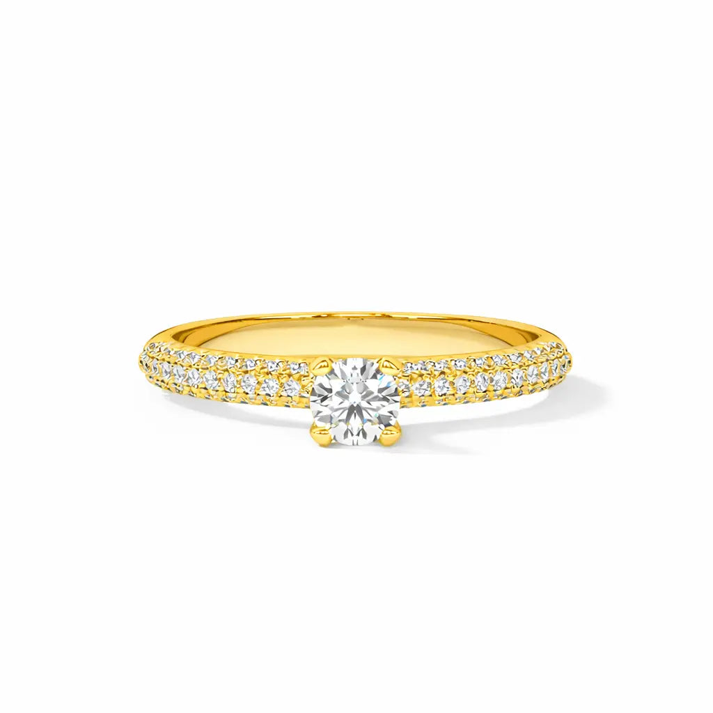 Gold ring with a diamond on a white background
