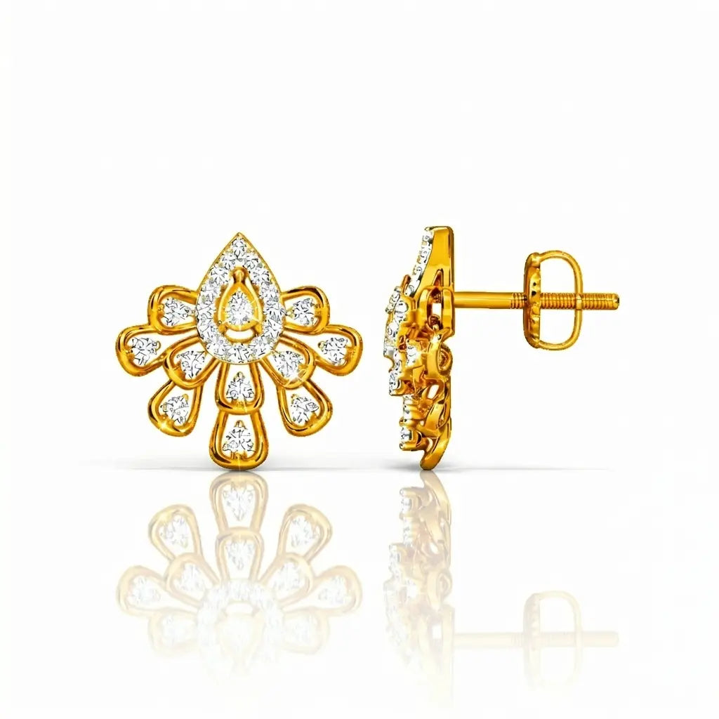 Gold earrings with intricate designs on a white background