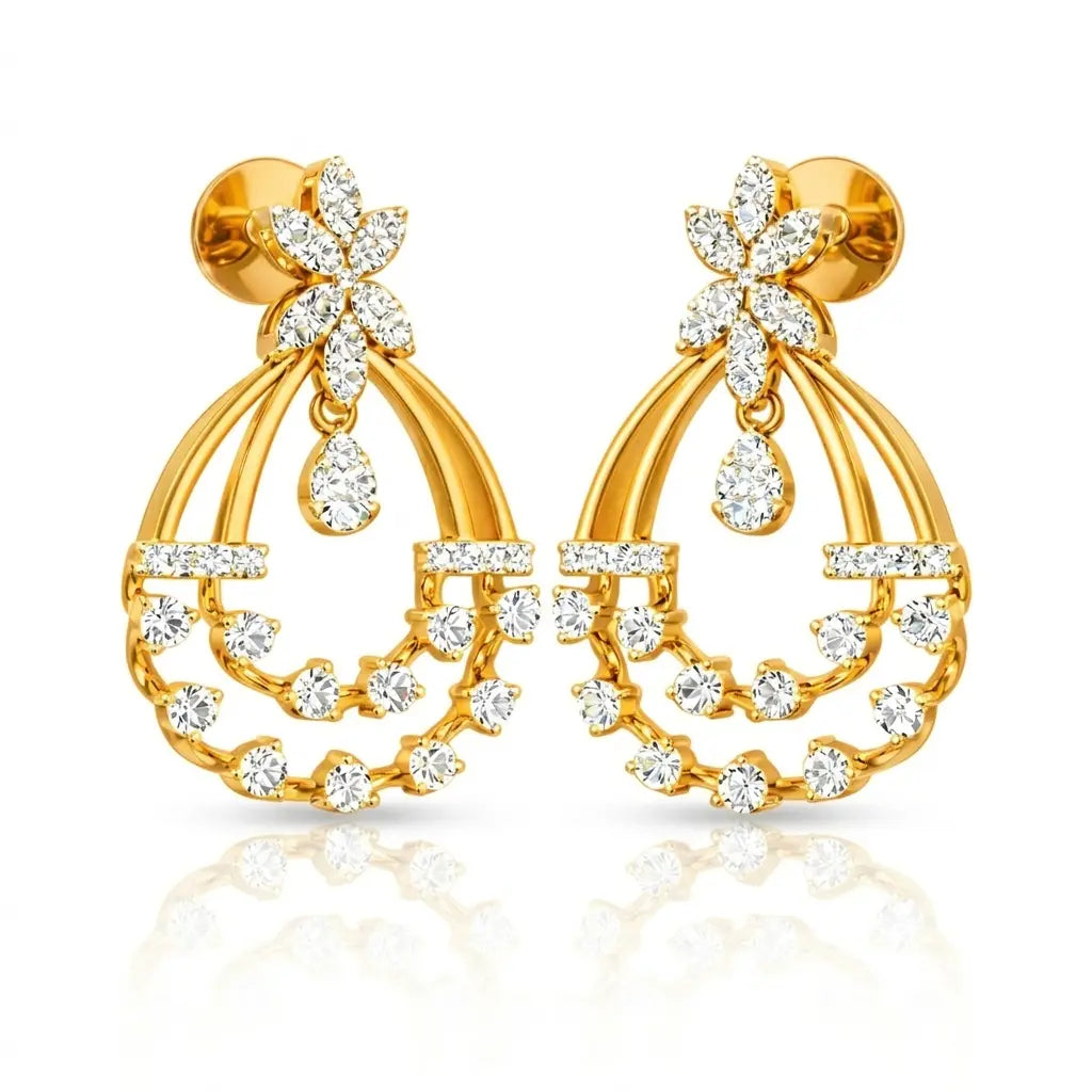 Gold earrings with clear gemstones on a white background