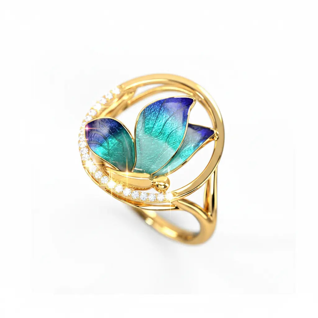 Gold ring with a butterfly-shaped gem on a white background