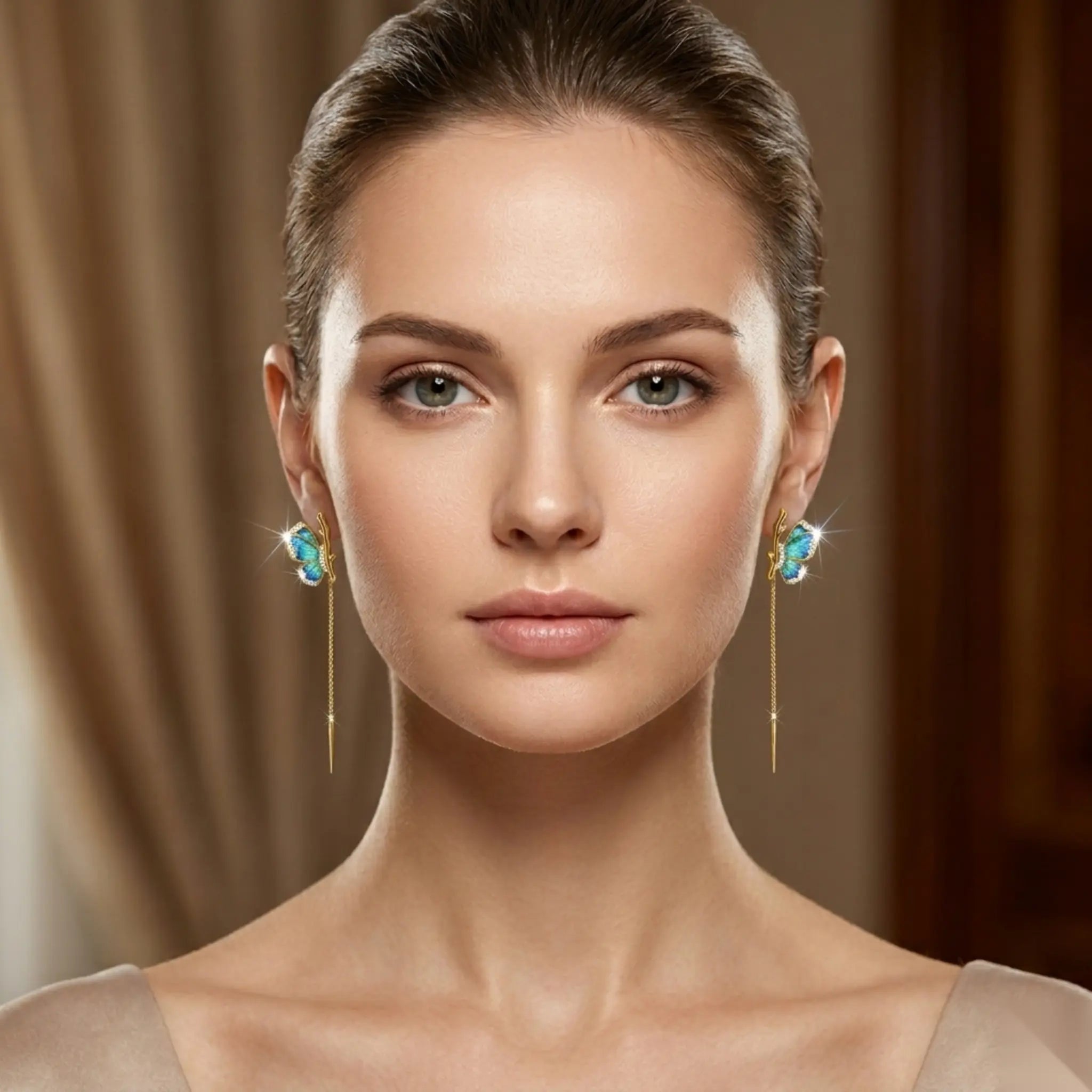 Close-up of a woman wearing turquoise earrings with a neutral background